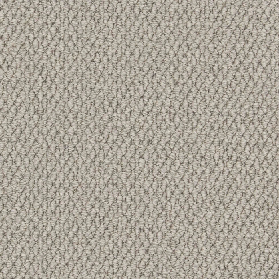 Light grey textured loop pile carpet detail, ideal for flooring and interior spaces