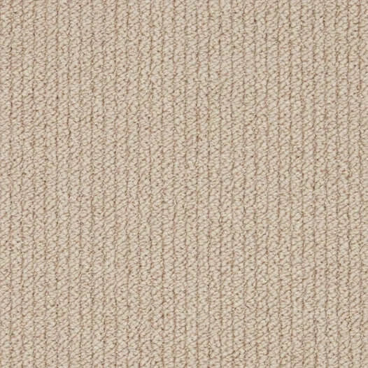 Beige loop pile carpet texture, sesame seed color, close-up flooring sample