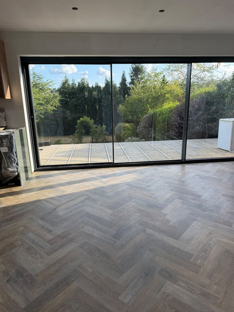 70m² Amtico herringbone LVT installation with border in Berkhamsted, Hertfordshire