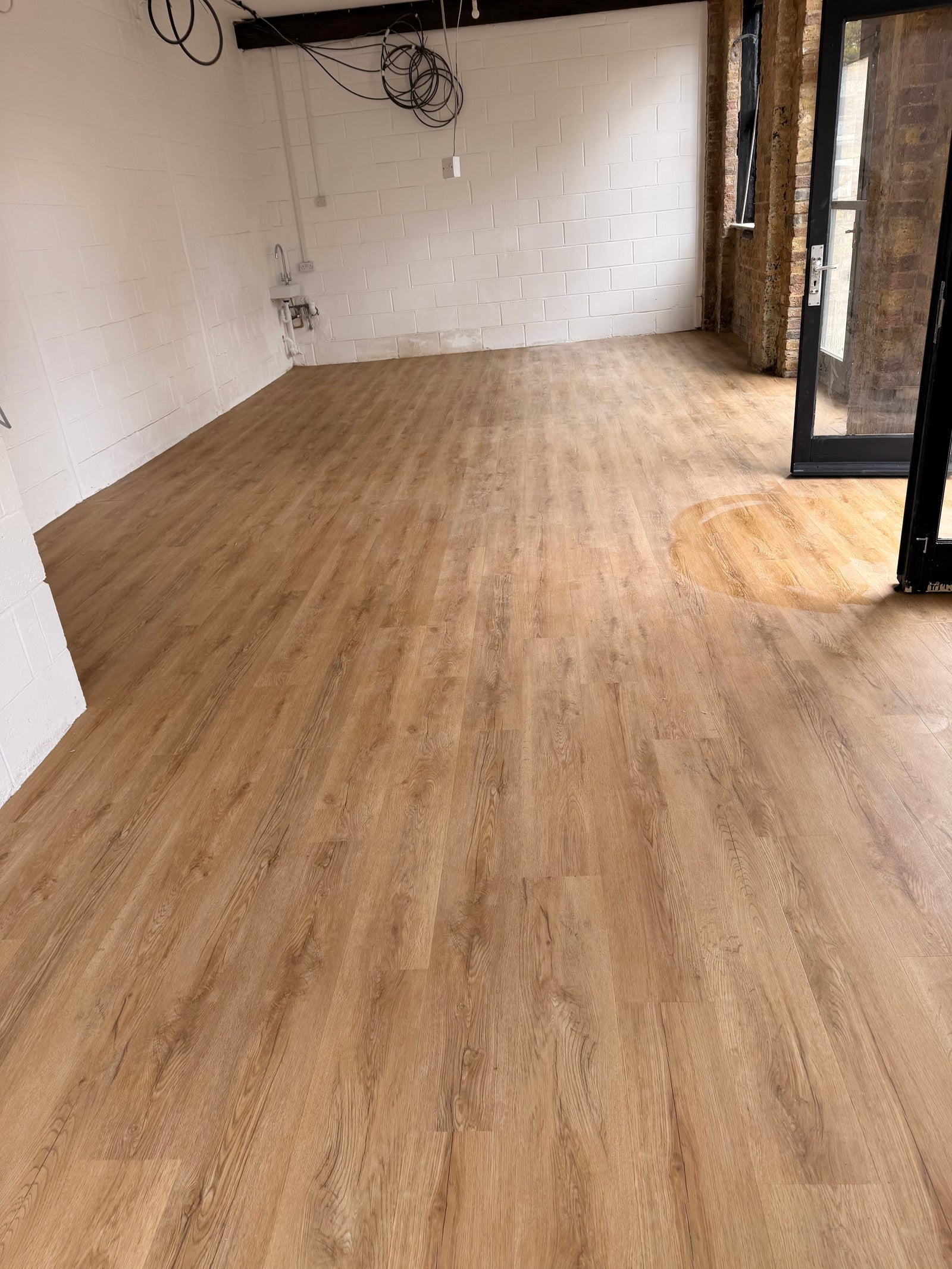 Loose Lay LVT Installation in Wimbledon, London – Bookshop Project by Exen Flooring