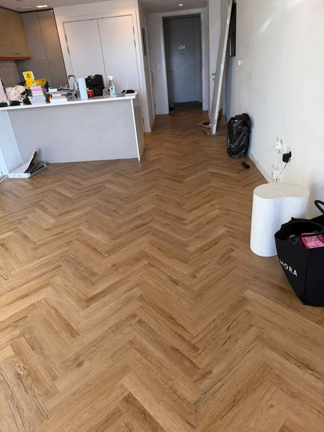 Karndean Van Gogh herringbone LVT installed by EXEN Flooring in Royal Victoria Dock, Newham