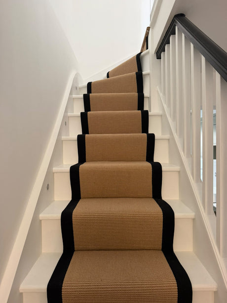 Jute stair runner with black taped edging installed by EXEN Flooring in Minford Gardens, Hammersmith and Fulham