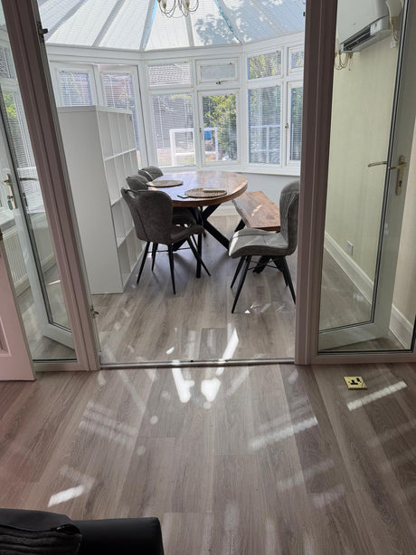 44m² Karndean Van Gogh LVT installation across a living room, kitchen and conservatory in Epsom, Surrey