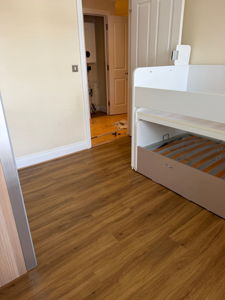 Oak-effect Polyflor Camaro Rigid Core flooring installed in a Twickenham-Richmond study room