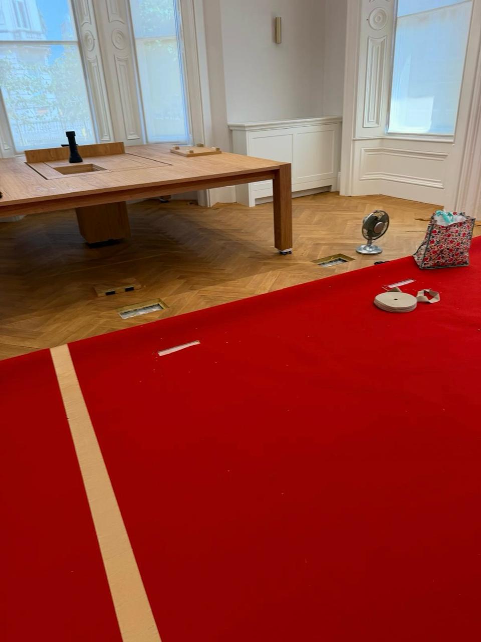Bespoke patterned carpet rug installed in a Central London hotel meeting room by EXEN Flooring