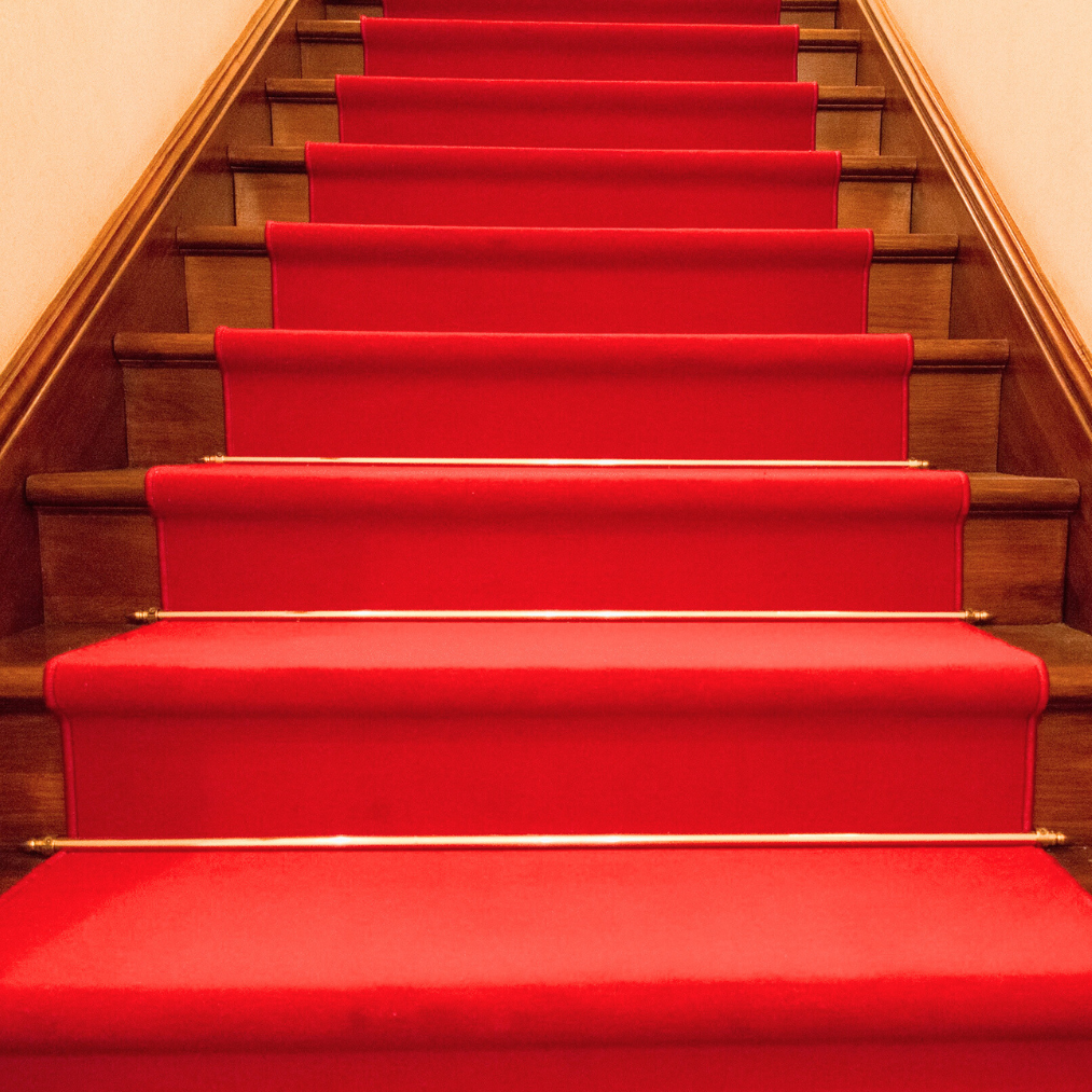 We provide a professional runner carpet fitting for stairs to enhance its look and comfort. You enjoy our stairs runner carpet fitting at home. - Exen Flooring